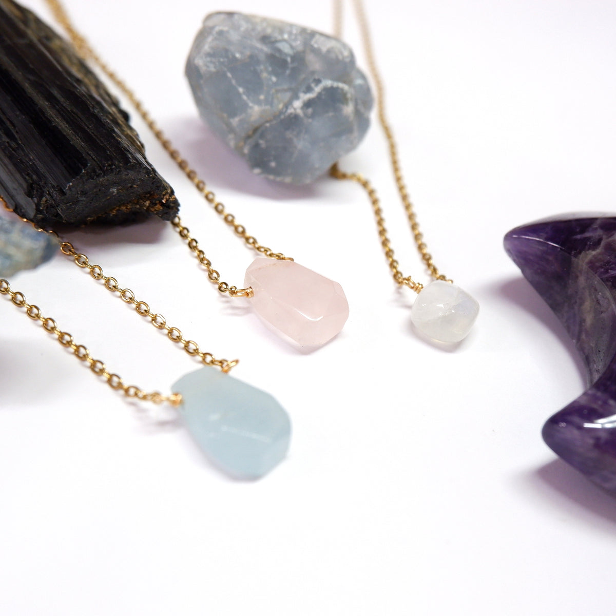 Necklace with stone pendants on a white background