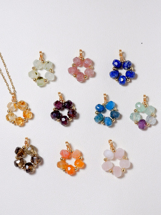 Set of colorful beaded necklaces on a white background